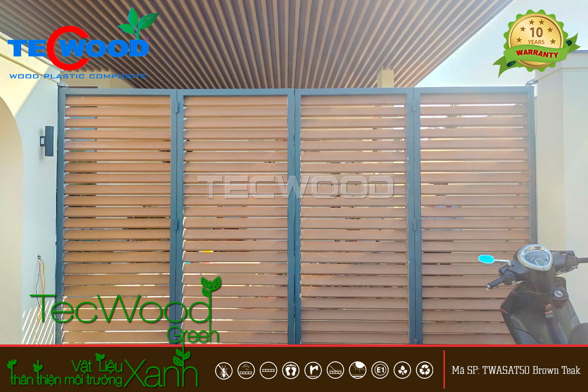 Cổng tòa nhà được làm bằng lam gỗ nhựa TWASAT50 kết hợp với thép không gỉ